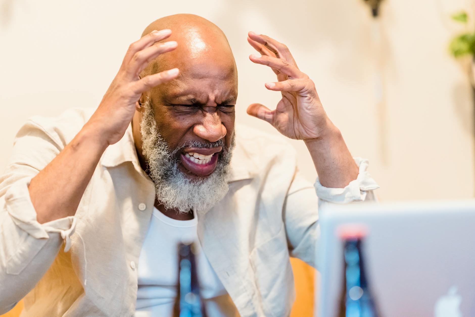 angry bearded bald man