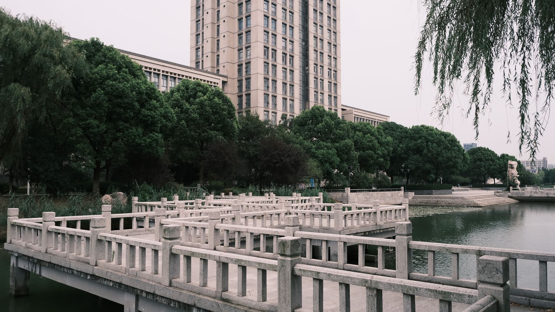 boardwalk over pond in park